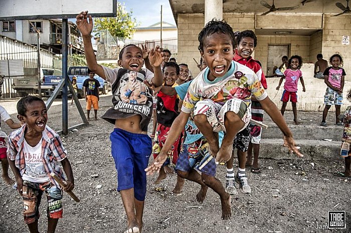 Photography arouses a lot of excitement. These kids are in Port Moresby.